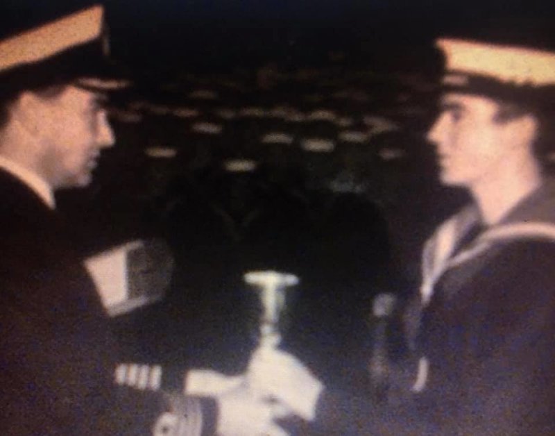 1972 - BRIAN TOMO THOMPSON, RECEIVING A TROPHY FROM CAPT. ASH.jpg
