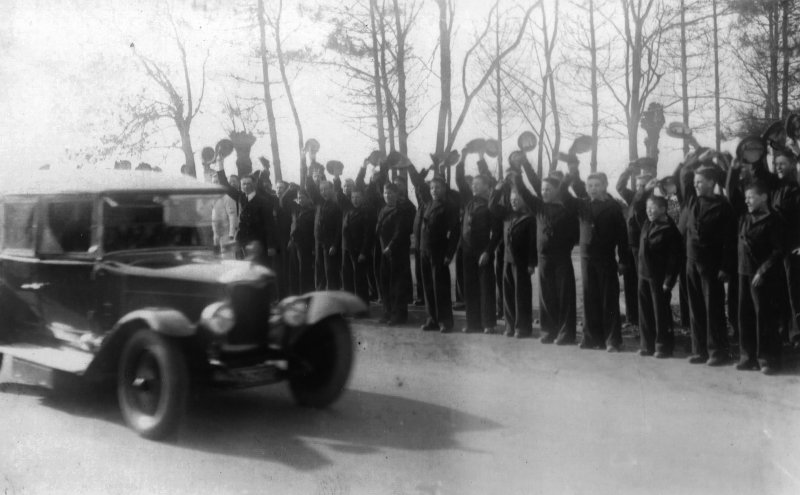 UNDATED - CAR BEING WAVED OFF BY THE BOYS.jpg