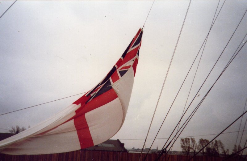 1989 - DICKIE DOYLE, THE SIZE 14 WHITE ENSIGN BEING LOWERED TO 'SUNSET' PLAYED BY RHS BAND, SEE NOTE BELOW.jpg