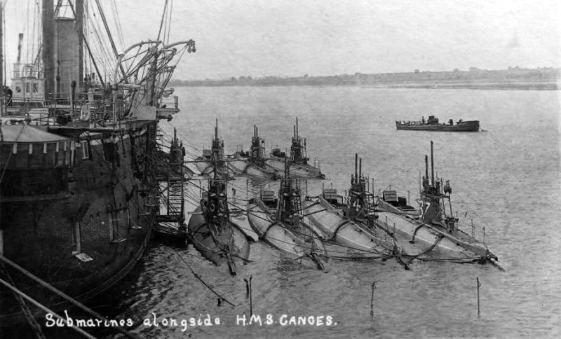 UNDATED - SUBMARINES ALONGSIDE HMS GANGES.jpg