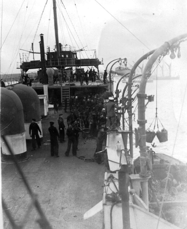 UNDATED - DICKIE DOYLE, HMS CAROLINE AT HARWICH, COALING SHIP.jpg