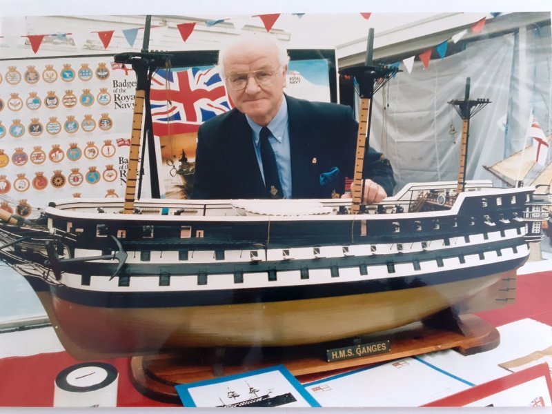 1949 - CLIFF BOYDEN, JOINED GANGES IN THIS YEAR AND IS SEEN WITH A MODEL OF HMS GANGES THAT HE MADE FOR THE MUSEUM, 01.