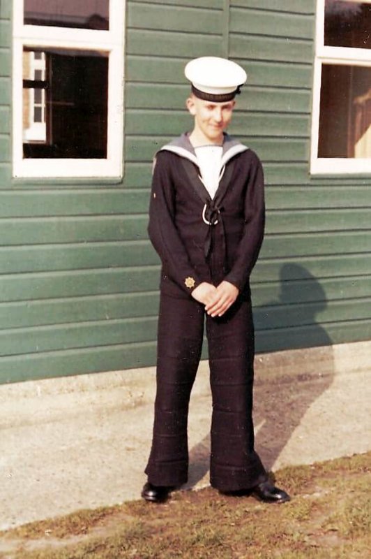 1962, JANUARY - JOHN WILKINSON, OUTSIDE MR. FISKS SHOP.jpg