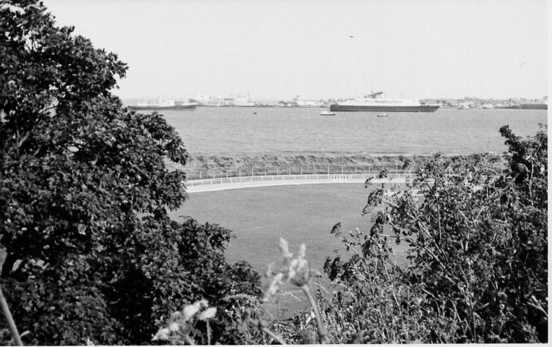 UNDATED - DICKIE DOYLE, LOOKING OVER THE RUNNING TRACK TOWARD HARWICH AND PARKESTONE.jpg
