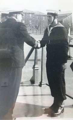 1973-76 - ANDREW BANKS, RECEIVING PRIZE OF TANKARD FOR BEST SHOT OF INTAKE FROM CAPT. MURRAY DUNLOP.jpg