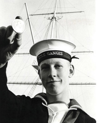 1970 - JOHN LONG WITH HIS MEDAL AS BUTTON BOY FOR THE CERMONIAL MANNING OF THE MAST