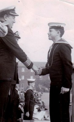 1965, 26TH APRIL - KELVIN JONES, RECEIVING MY RUGBY COLOURS FROM THE CAPT. WATSON, WITH CDR. HOWARD.jpg
