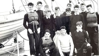 1961, OCTOBER - ANDREW CAMPFIELD, BLAKE, 36 CLASS, ON THE PIER TO SAIL A 32 FOOT CUTTER.jpg