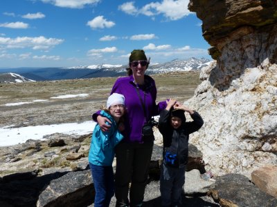 Gwen and kids shivering on a mountain pass