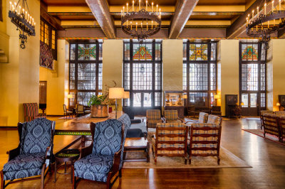 The stained glass windows flanking one side of the Great Lounge