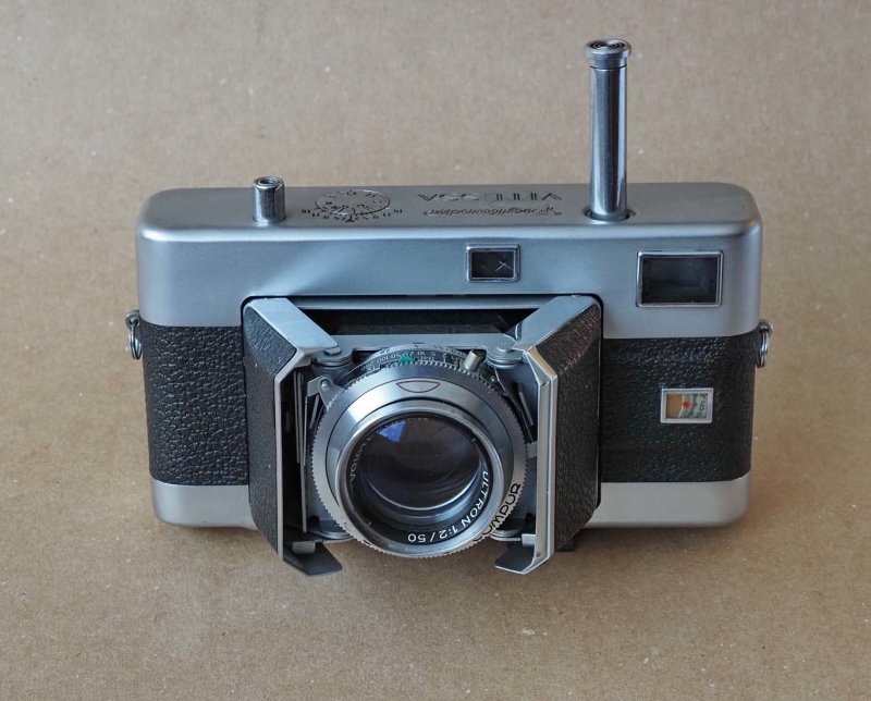 The Voigtlander Vitessa (1950); to advance the film, the long vertical lever should be pushed down.