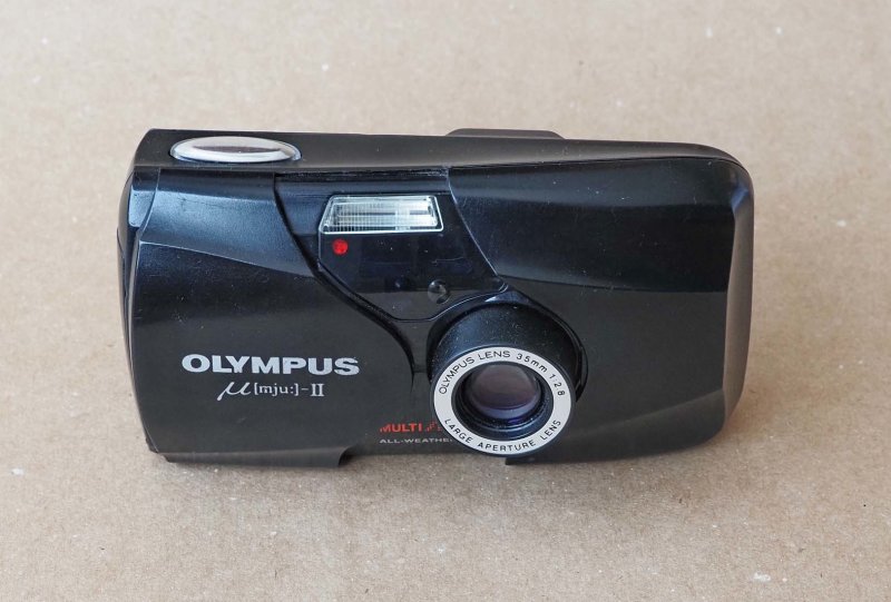 The Olympus Mju II, with a very good 4 elements F2.8 lens.