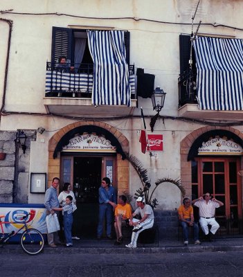 Sicily; in the streets. 