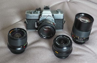 The Minolta SRT 303 and the Rokkor lenses 24/2.8, 35/2.8, 50/2 and 135/2.8.