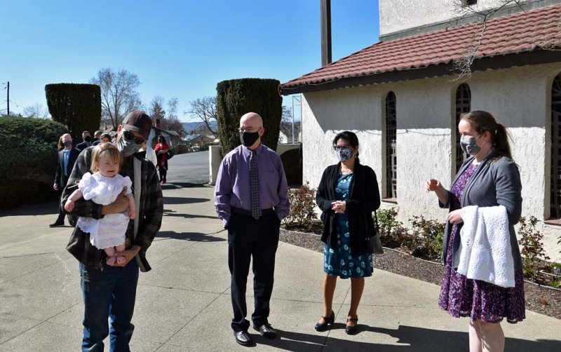 Gathering outside the Chapel, waiting for the pervious family to finish