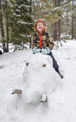 Charles riding the snow elephant