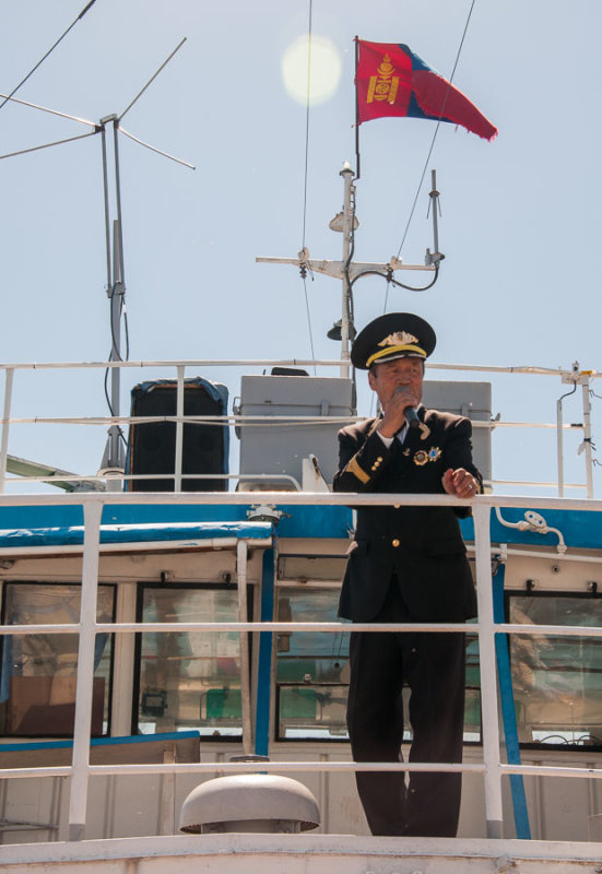 Smartly-uniformed captain of the 'Sukhbaatar' on Lake Khövsgöl, Mongolia