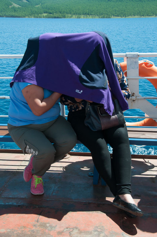 Delicate discussions? Sharing selfies? A private moment aboard the 'Sukhbaatar'