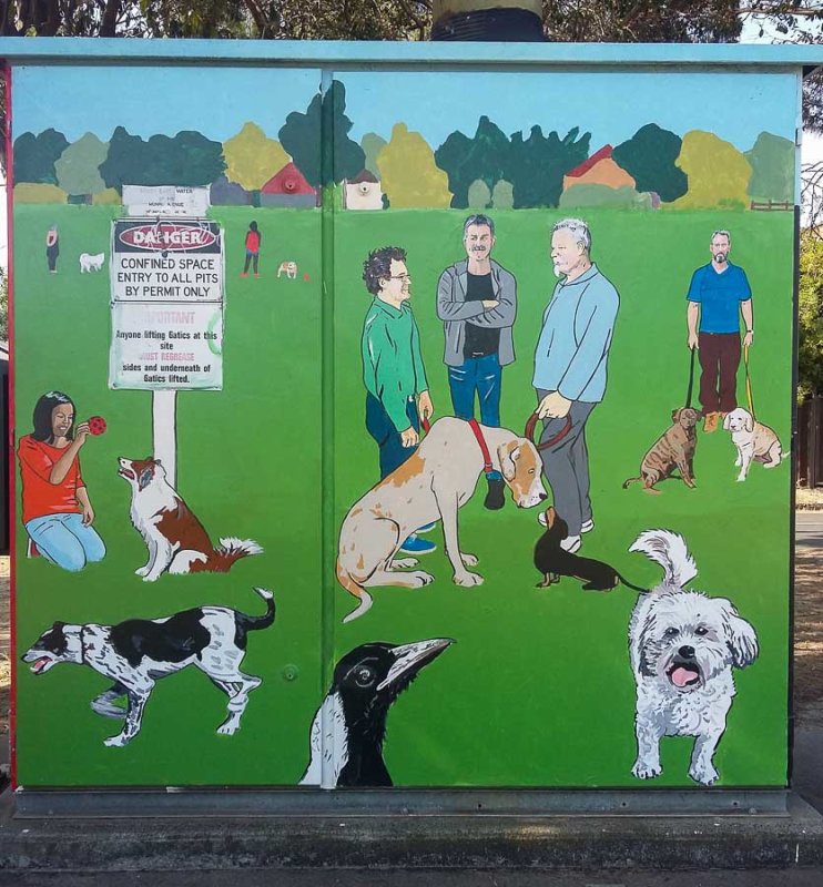 Dog-owners feature in this street art mural in a suburban park, Melbourne, Australia