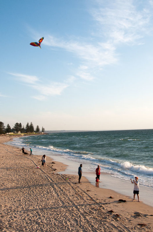 Flying a kite at Glenelg, South Australia