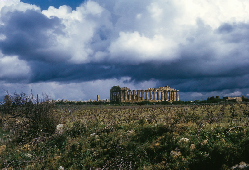 Storm clouds gather over an ancient Greek temple, Selinunte, Sicily
