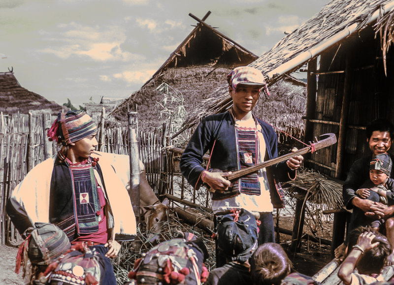 Akha people entertain their visitors, northern Thailand