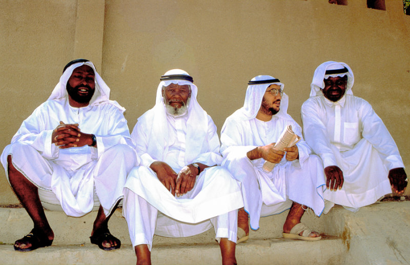 Four Arab Nationals passing the time