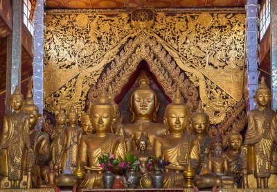 Buddhas arranged inside a temple in Kengtung, Myanmar