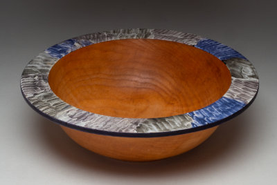 Bowl with iridescent rim  9 1/4 diameter x 2 3/4 high Tung Oil finish.