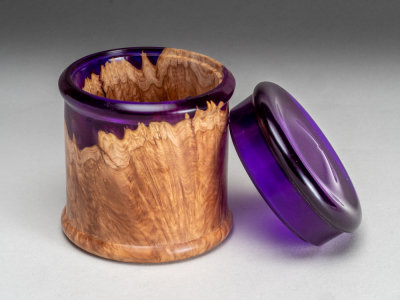 Lidded box made from burl with colored acrylic 2 3/4 diameter x 3 1/2 high.