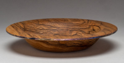 Black Limba wooden bowl  8 5/8 diameter x 1 1/2 high.  Tung oil finish.