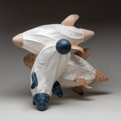 Blimps at play, a wood, reed and paper sculpture.
