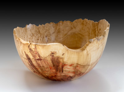 Natural edge bowl from Manitoba Maple burl.