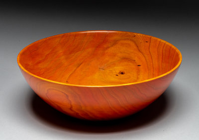 Maple bowl dyed orange.