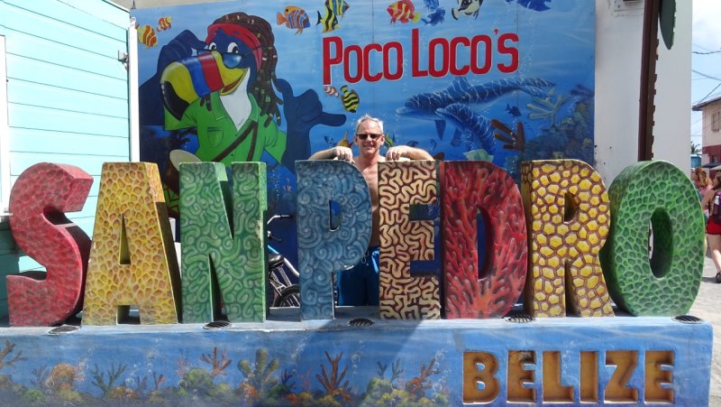 Eric with San Pedro Town San Pedro Town Sign