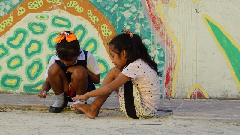 Girls Playing on the street in San Pedro Town