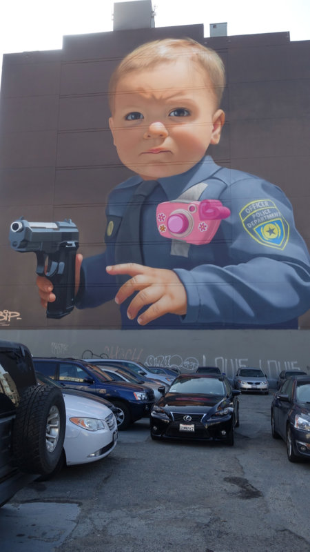 Baby with a Handgun
