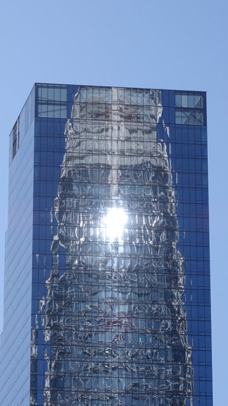 Salesforce Tower reflected in Millennium Tower