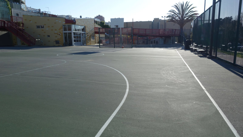 A basketball waits for someone to come play at Helen Wills Playground