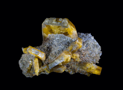 Golden baryte crystals to 9 cm across in 20 cm group. Meikle Mine, Nevada, USA.