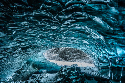 Cave in blue ice at the snout of the glacier at Jkulsrln