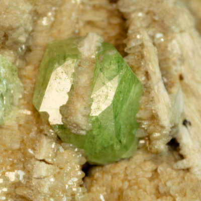 Andradite var demantoid crystal showing rhomb dodecahedron and octahedron faces, Khost, Afghanistan