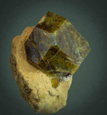 Andradite-grossular crystal, 4 cm in diameter, cube and dodecahedron, Fushan Fe deposit, Xingtai, Hebei, China