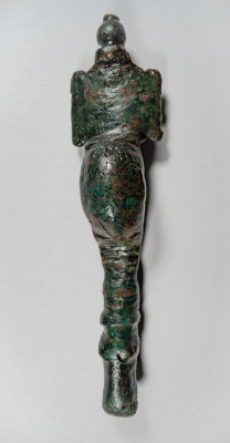 Cruciform brooch with horsehead foot terminal, 106 mm long, from Lincolnshire. Probably 5th Century
