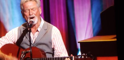 Larry Gatlin belting out a song