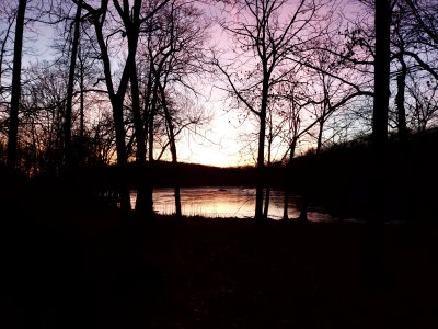 Winter sunset over frozen Johnsons Lake