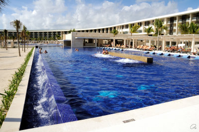 Infinity Pool with Bar and Fountains