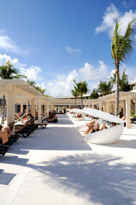 Pool Walkway with 'Clamshell' Loungers