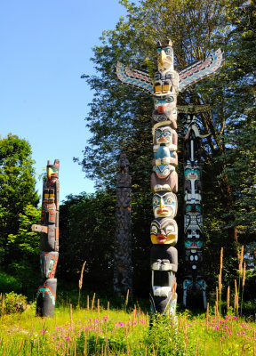 KakasoLas Totem Pole (center) and Chief Wakas Totem Pole (rear) and Oscar Maltipi Totem Pole (left)