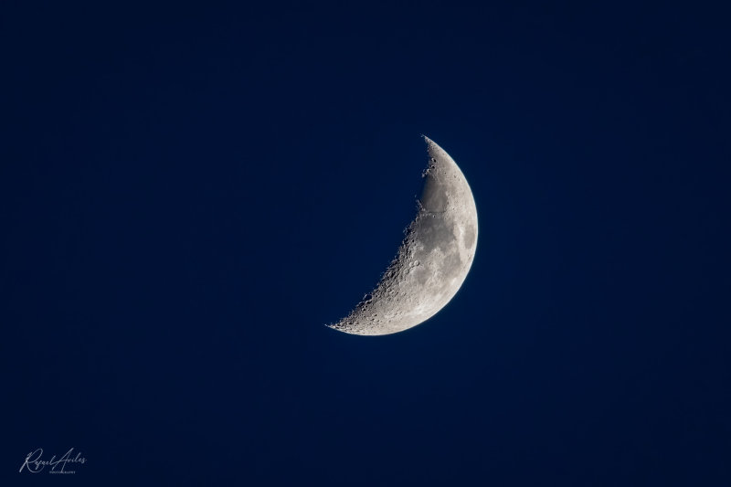 Waxing crescent in the blue hour